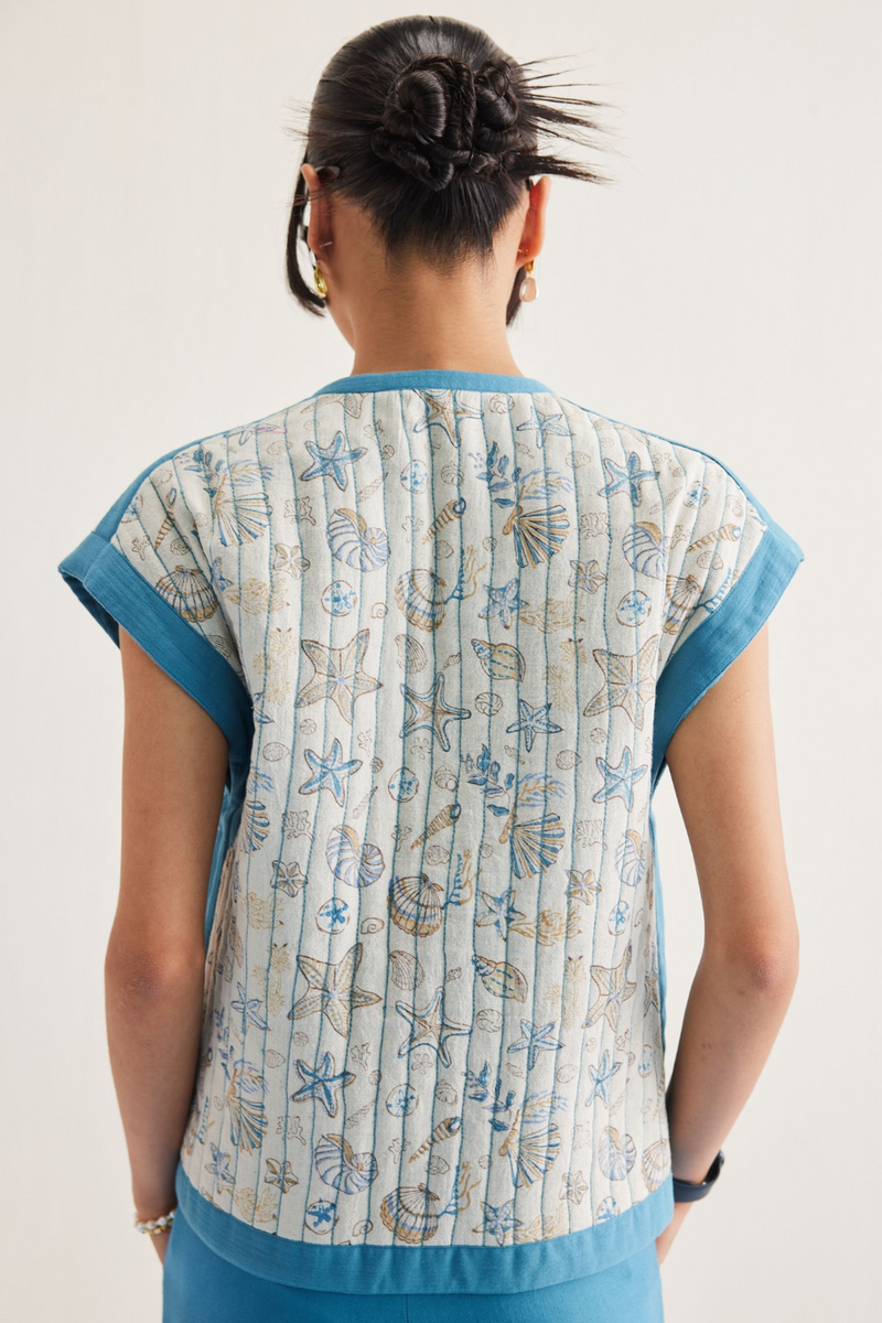The Tidal Organic Cotton Reversible Vest cotton by SUI in blue color for women Worldwide