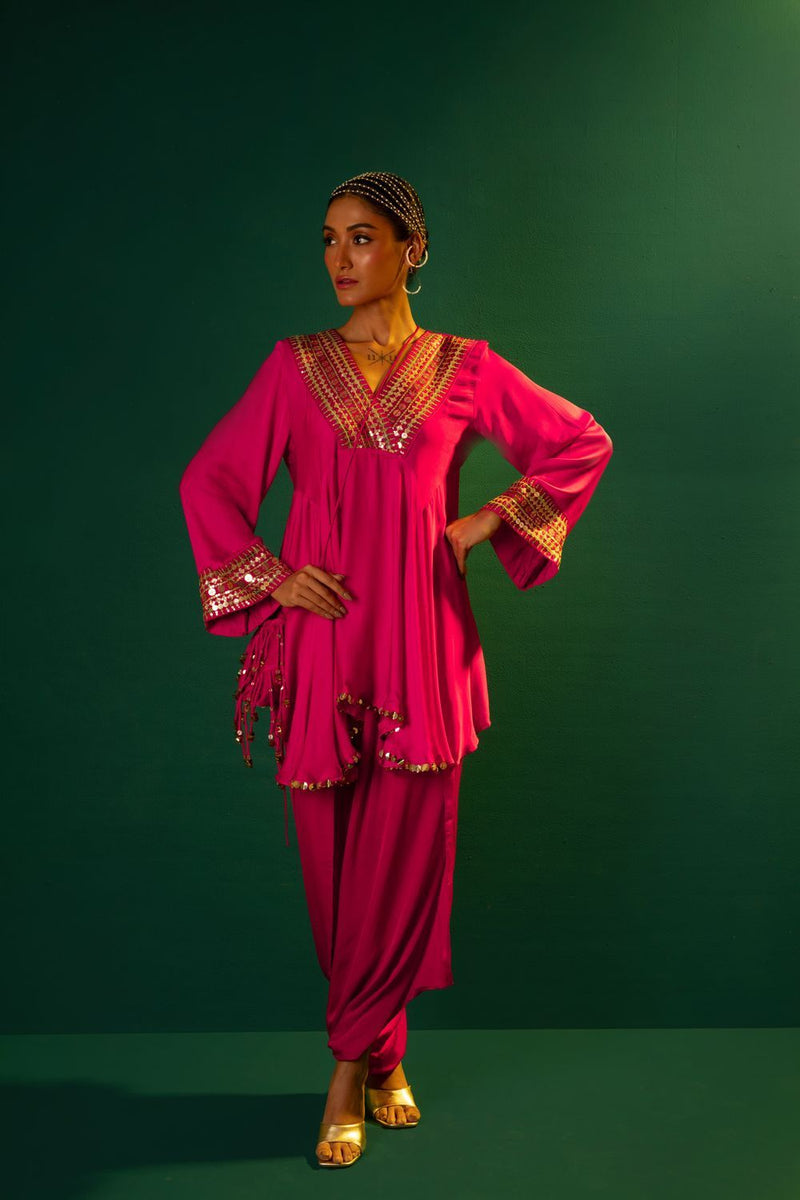 Chamakeen Ariyana Fuscia Asymmetrical Tunic with Dhoti Skirt satin by PRAHNAAYA in pink color for women Worldwide