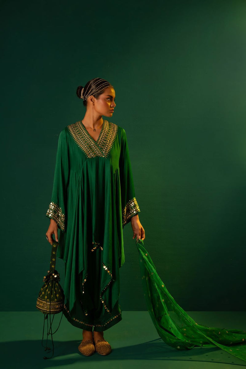 Chamakeen Ariyana Green Asymmetrical Tunic Set with Dupatta satin by PRAHNAAYA in green color for women Worldwide