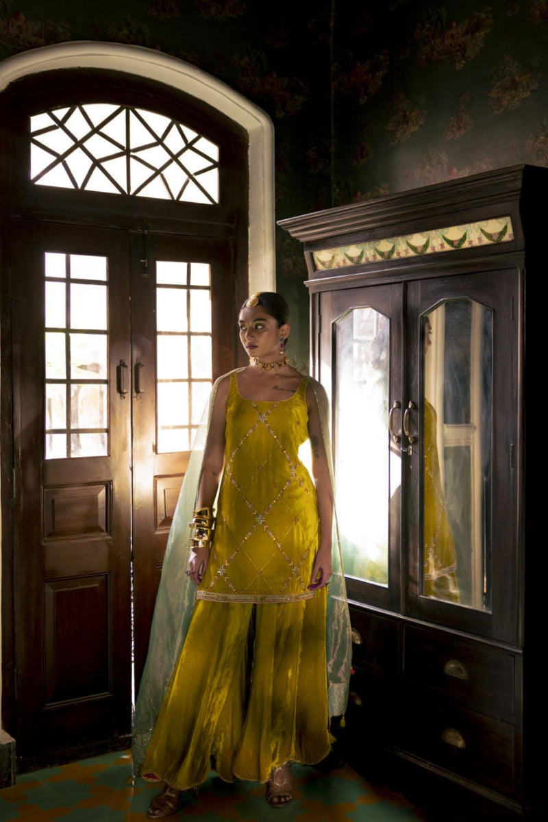 Fariba Yellow Silk Velvet Sharara Set Kurta Sets by Rajiramniq for women Worldwide