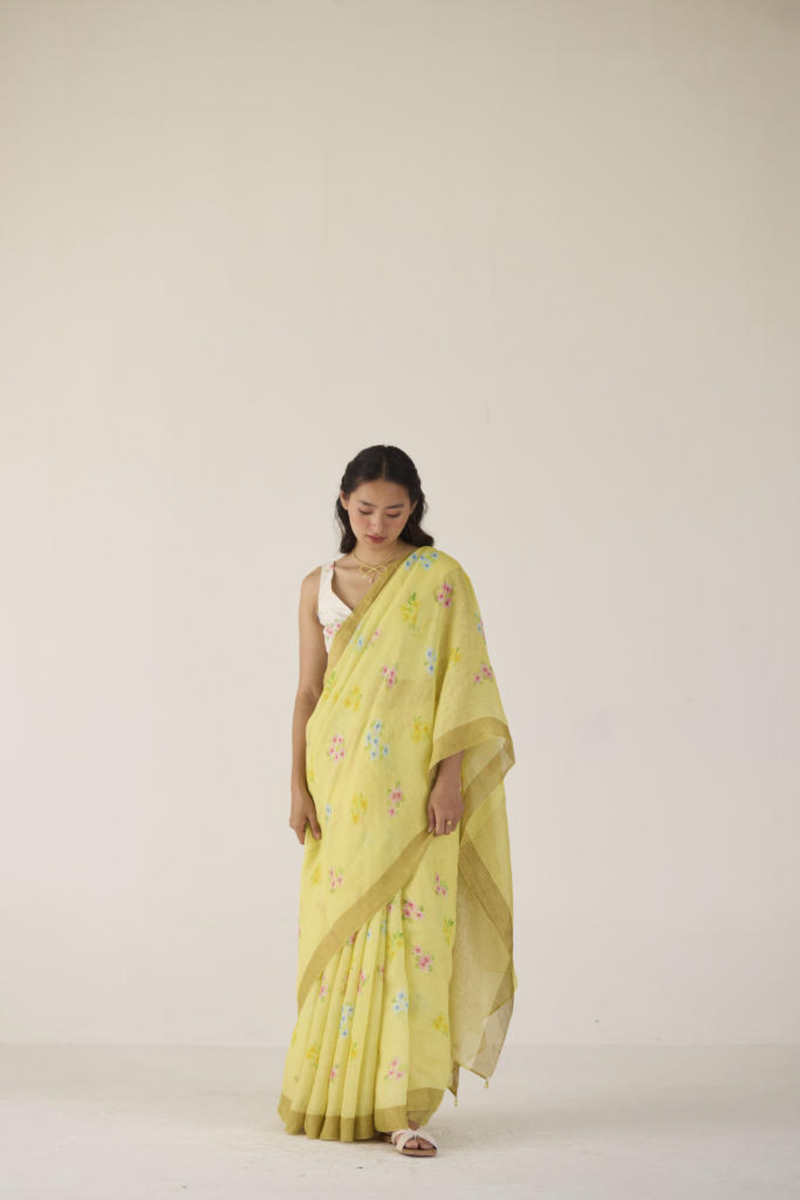 Periwinkle Linen Yellow Sari by Nadiya Paar in yellow color for women Worldwide