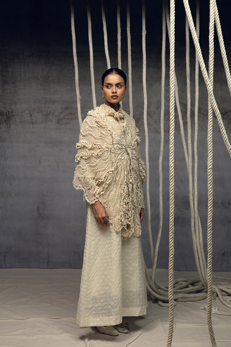 Ivory Crochet Lace Embroidered Cape hand crochet jacket/overlay by Kritika Murarka in ivory for women Worldwide