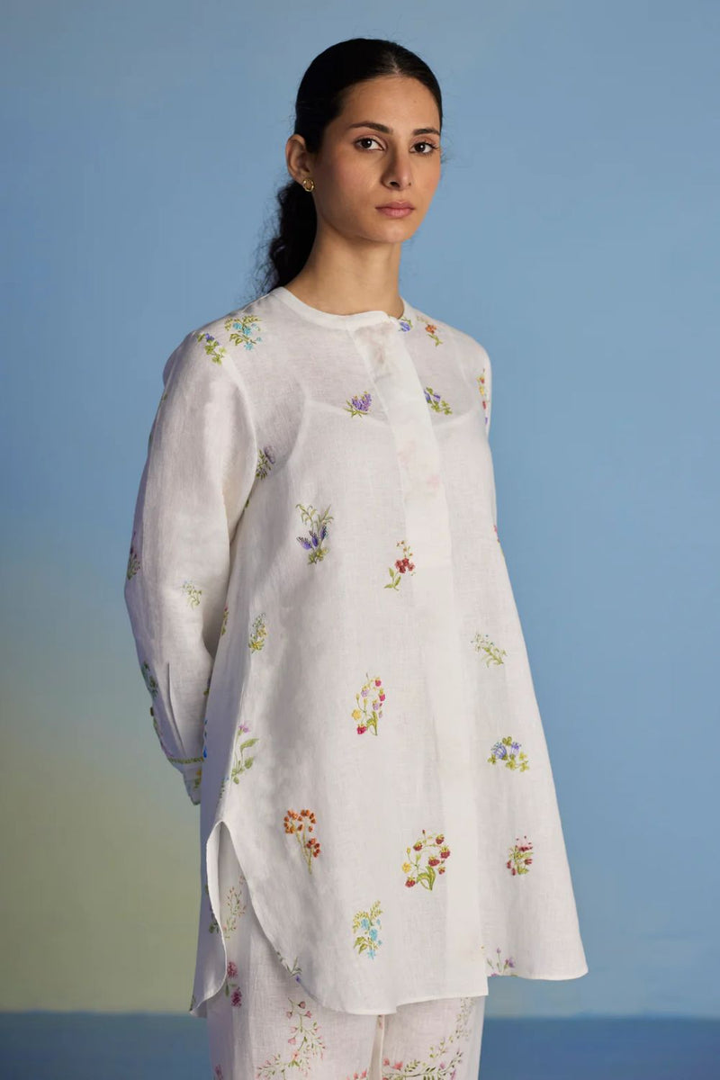 Anya Hand-Embroidered Floral Linen Kurta - White linen by Manan in white color for women Worldwide