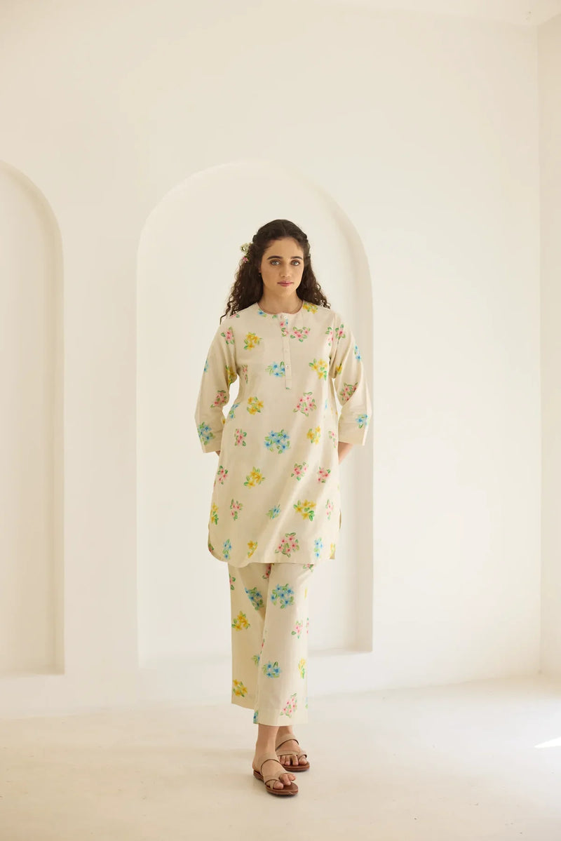 Periwinkle Short Kurta Set cotton by Nadiya Paar in white color for women Worldwide