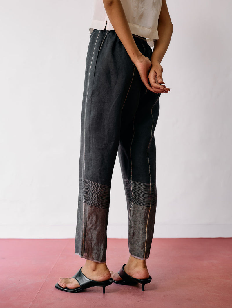 Nila Tapered Metallic Linen Pants-Charcoal linen pant/trousers by Manan in black for women Worldwide