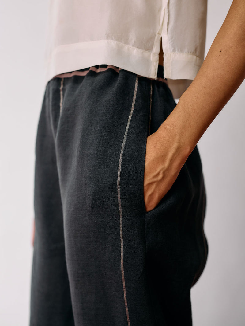 Nila Tapered Metallic Linen Pants-Charcoal linen pant/trousers by Manan in black for women Worldwide
