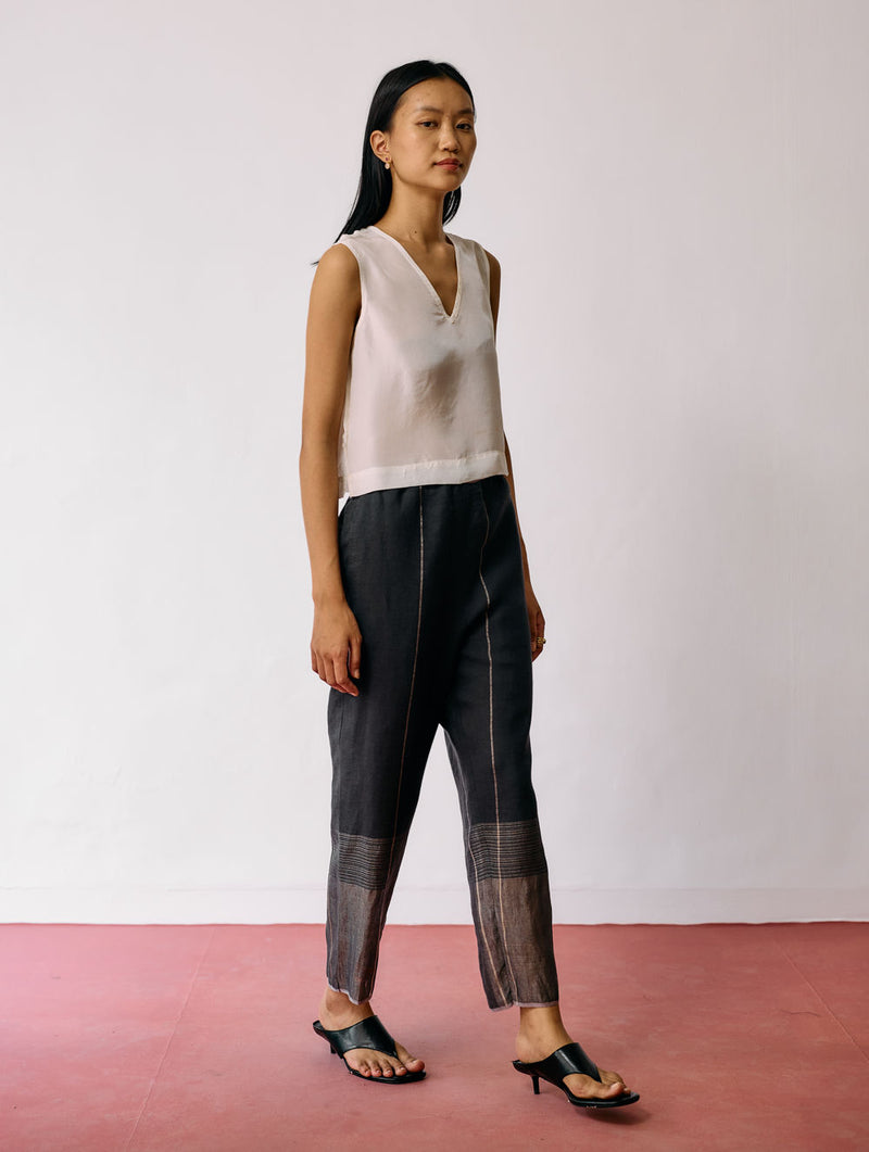 Nila Tapered Metallic Linen Pants-Charcoal linen pant/trousers by Manan in black for women Worldwide
