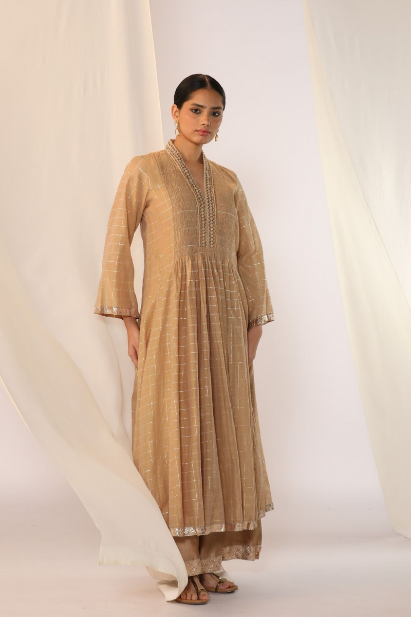 Checks kurta with a smocked neck with wide-leg pants chanderi by Myoho in beige color for women Worldwide