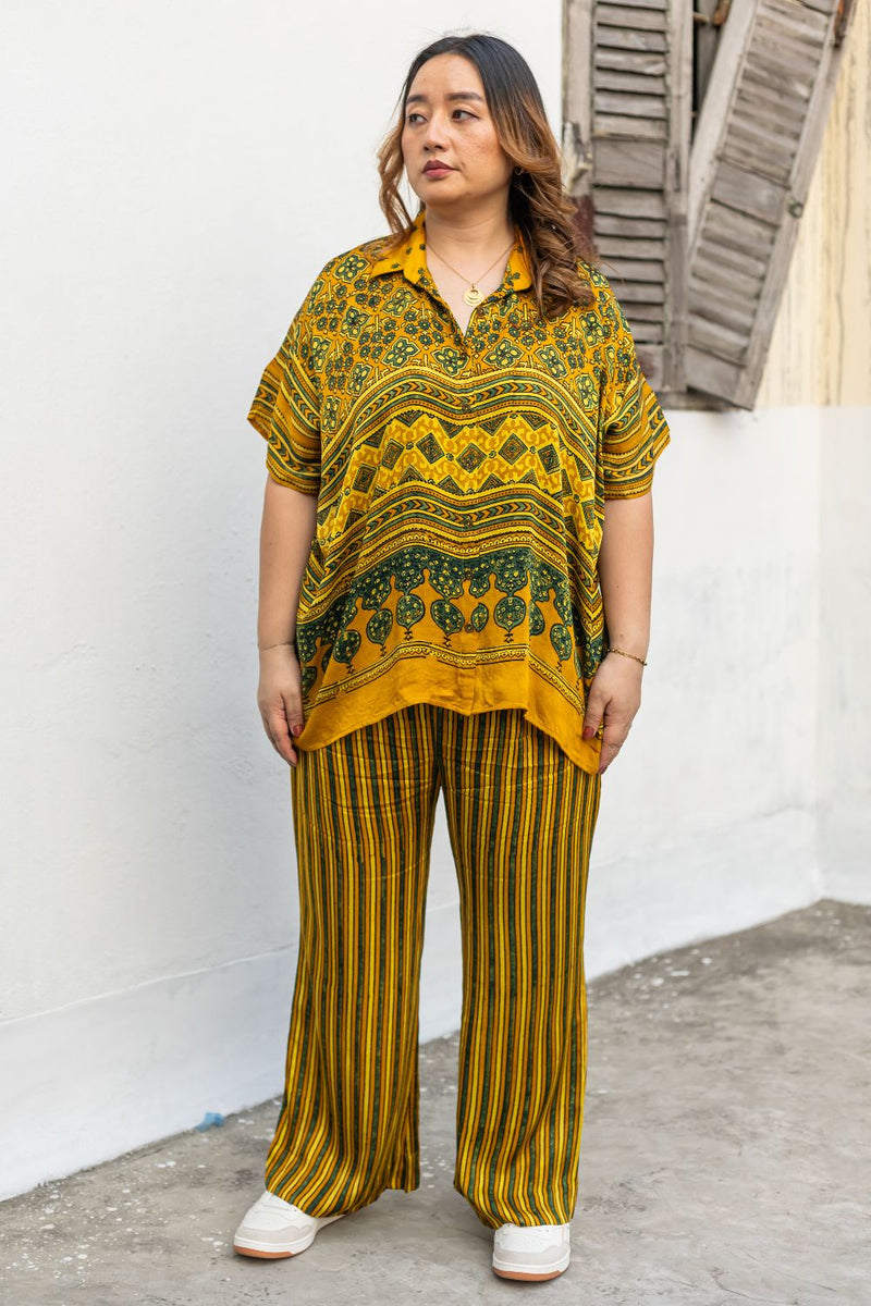 Hyde Yellow AntiFit Shirt and stripes pants Two-Piece Set satin by PRAHNAAYA in yellow color for women Worldwide