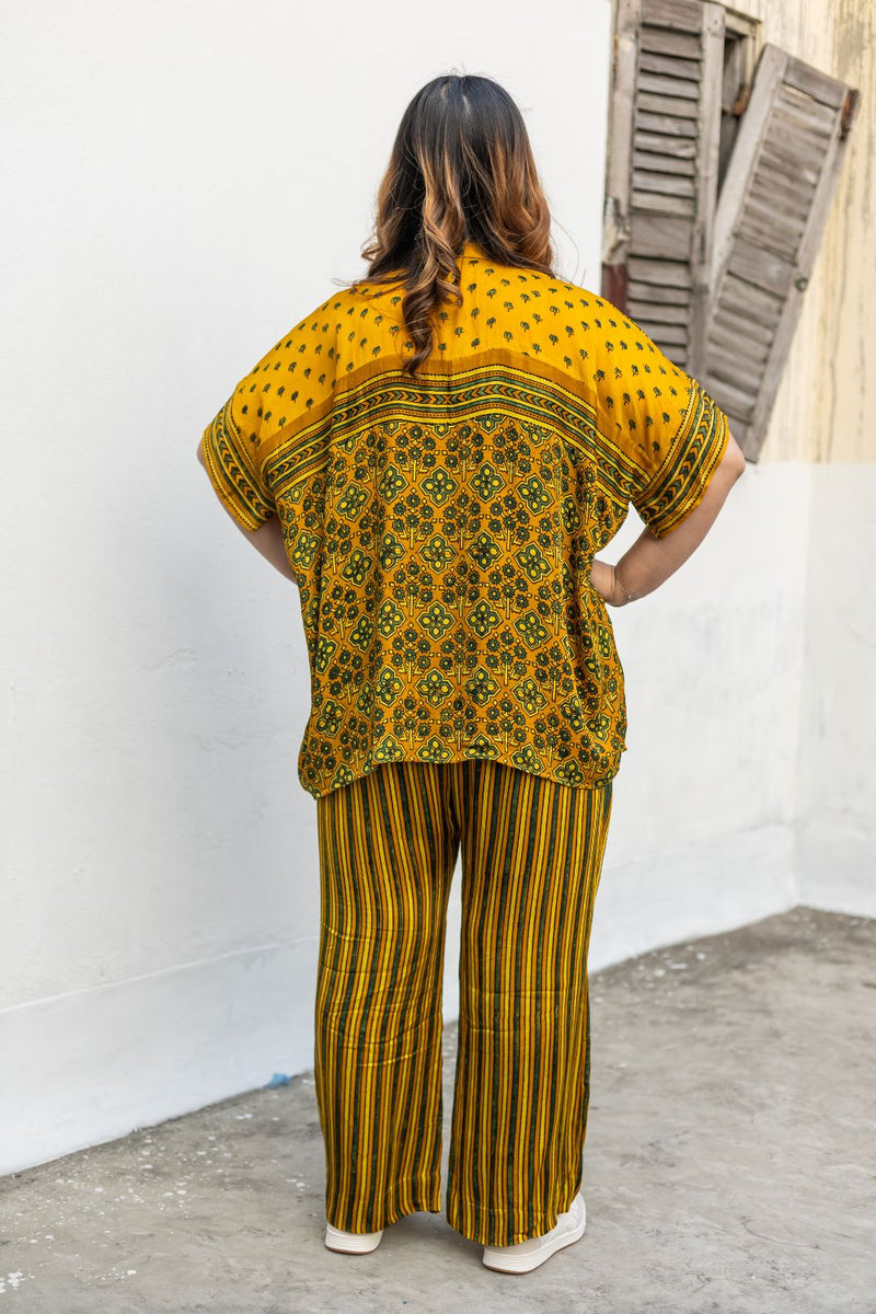 Hyde Yellow AntiFit Shirt and stripes pants Two-Piece Set satin by PRAHNAAYA in yellow color for women Worldwide