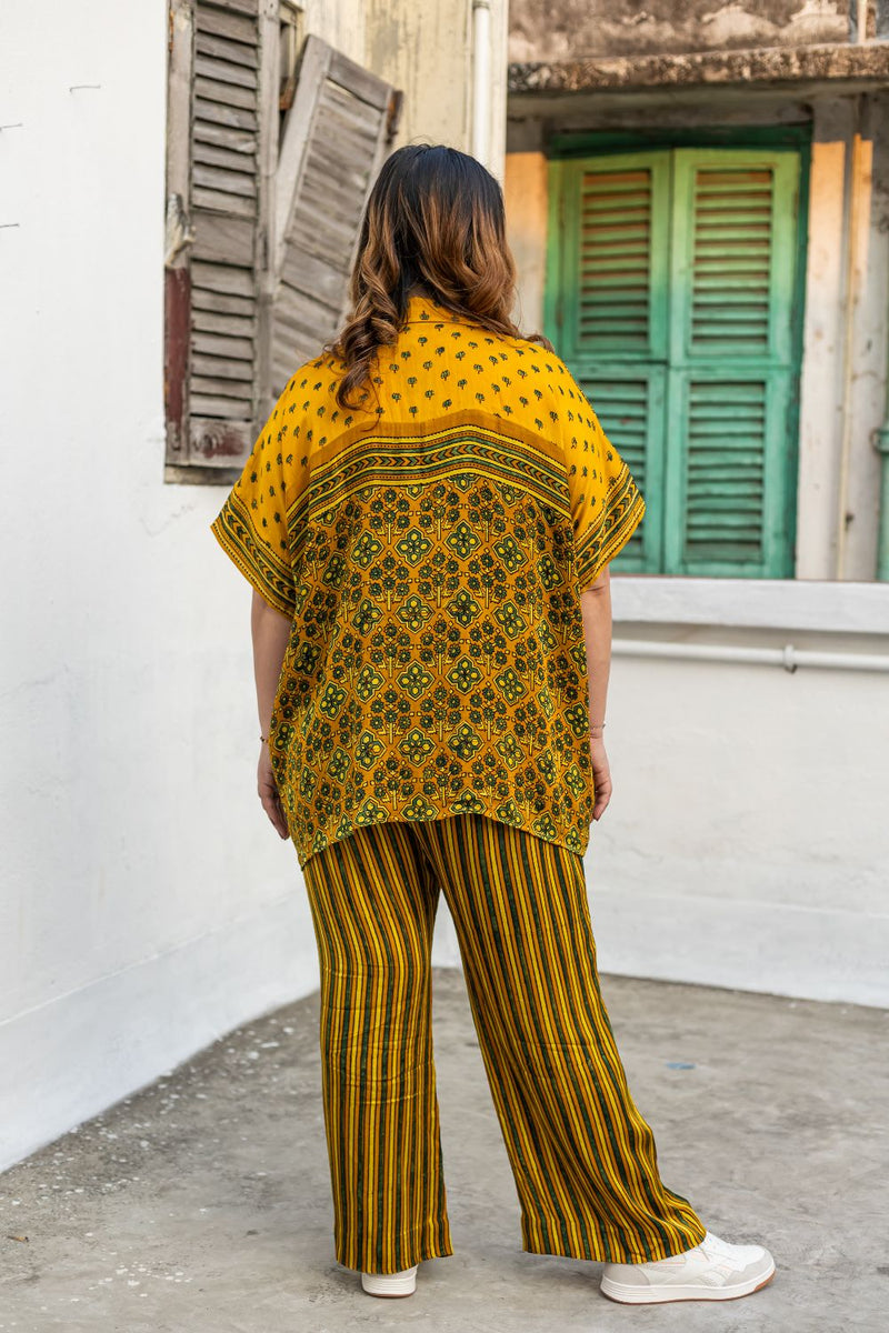 Hyde Yellow AntiFit Shirt and stripes pants Two-Piece Set satin by PRAHNAAYA in yellow color for women Worldwide