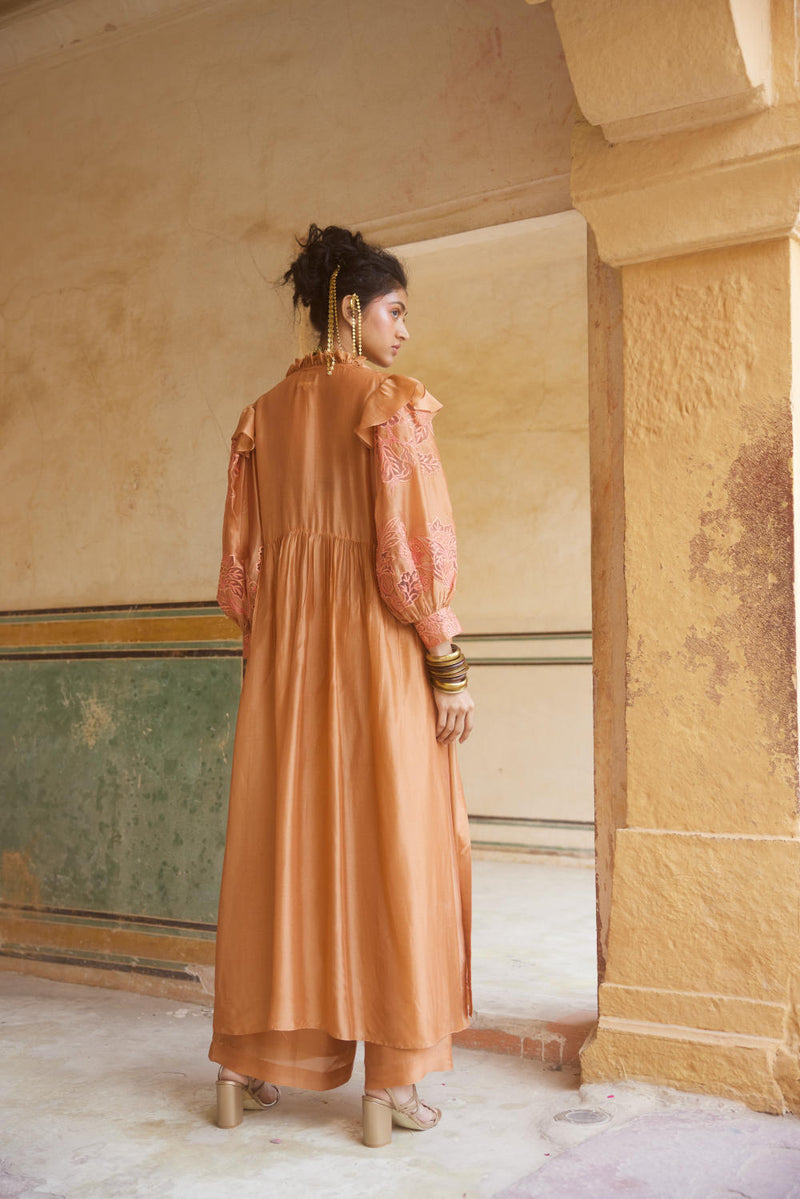 PH-2311 
Jacket 
Blouse 
Trouser Set-Peachy orange organza by Paulmi & Harsh in peach color for women Worldwide