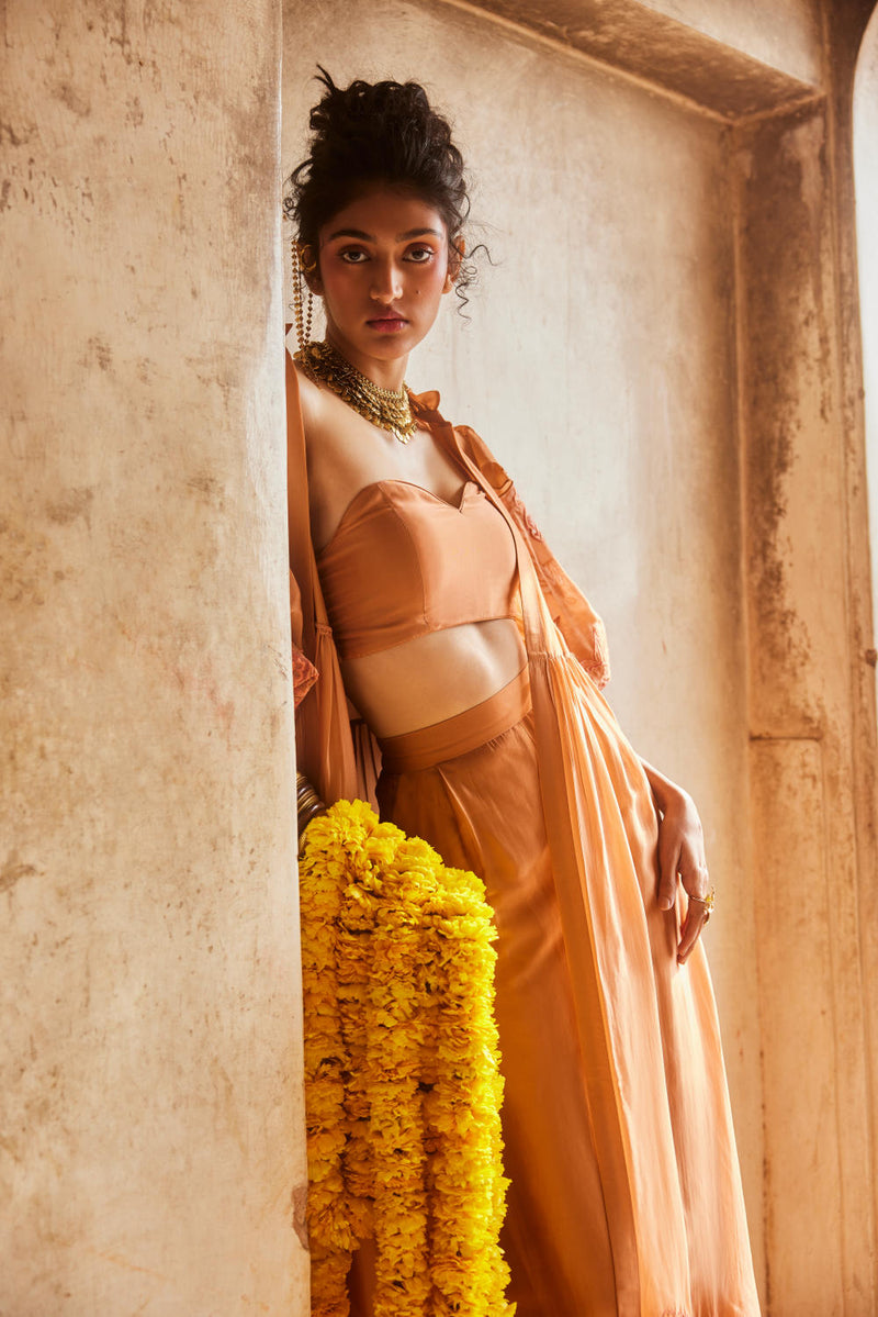 PH-2311 
Jacket 
Blouse 
Trouser Set-Peachy orange organza by Paulmi & Harsh in peach color for women Worldwide
