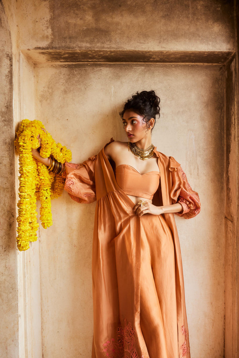 PH-2311 
Jacket 
Blouse 
Trouser Set-Peachy orange organza by Paulmi & Harsh in peach color for women Worldwide