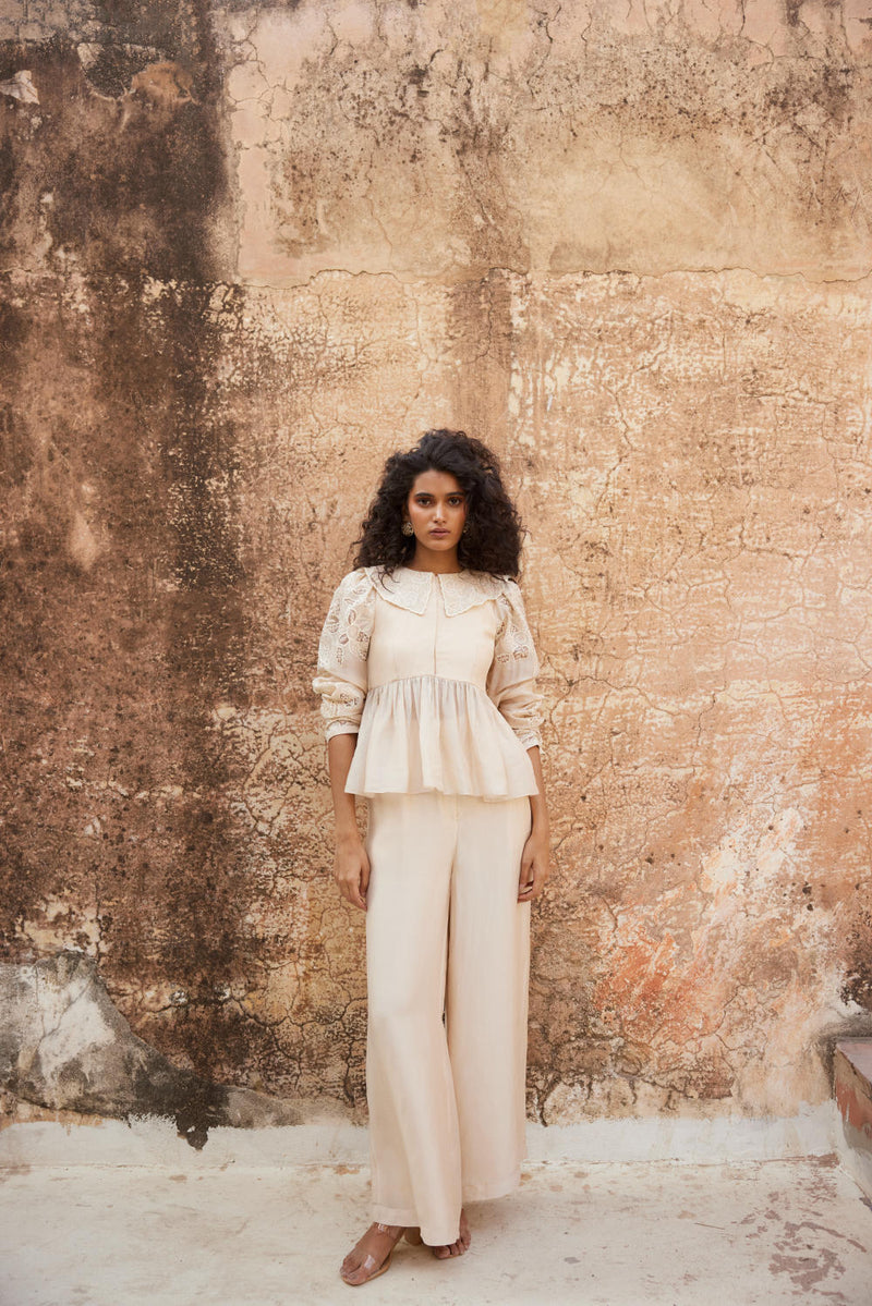 PH-2315 
Peplum 
Trouser Set-Ivory organza by Paulmi & Harsh in ivory color for women Worldwide