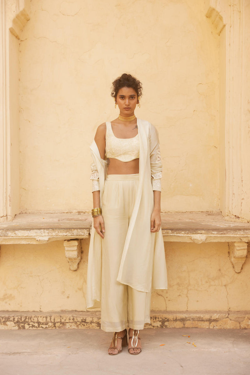 PH-2317 
Blouse 
Jacket 
Trouser Set-Ivory organza by Paulmi & Harsh in ivory color for women Worldwide