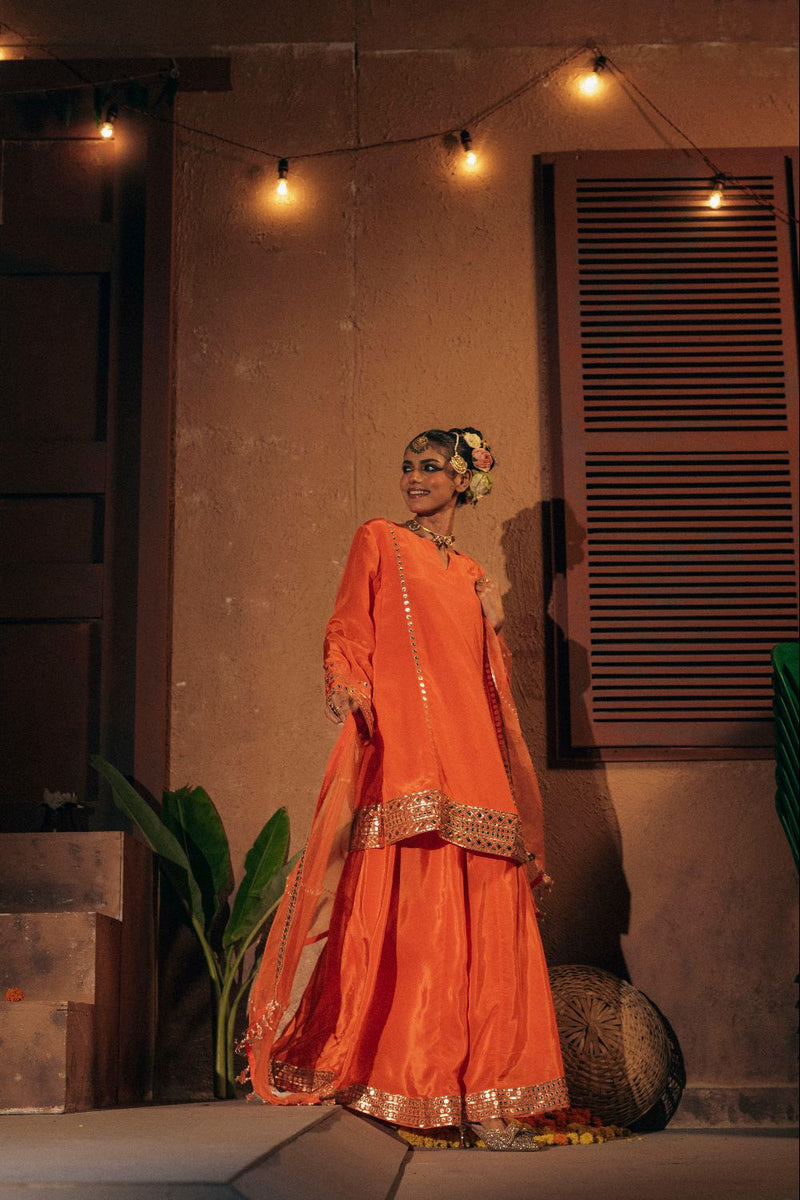 Mangala Sharara Set- Orange silk by PRAHNAAYA in orange color for women Worldwide