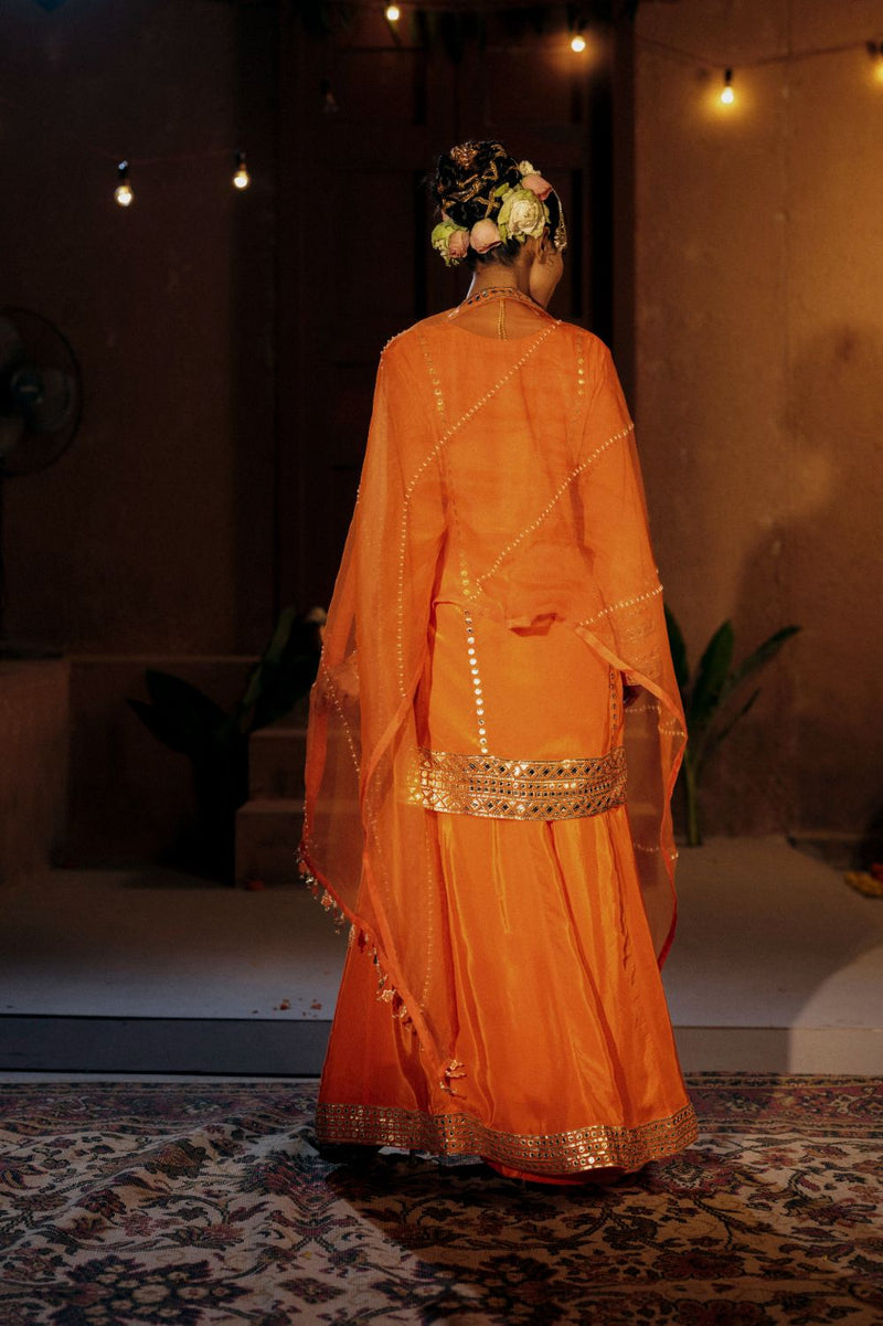 Mangala Sharara Set- Orange silk by PRAHNAAYA in orange color for women Worldwide