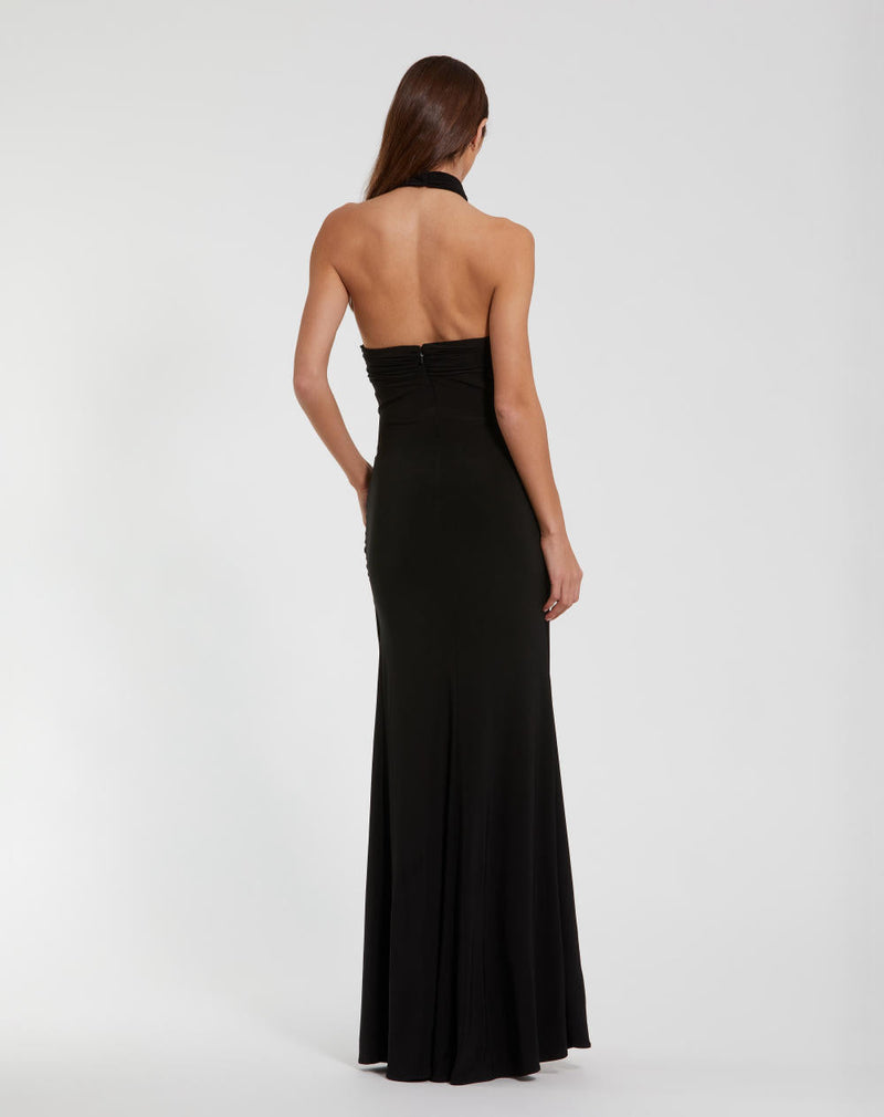 27572-Jersey Crossover Halter Neck Gown With 3D Flower by Mac Duggal in black color for women Worldwide