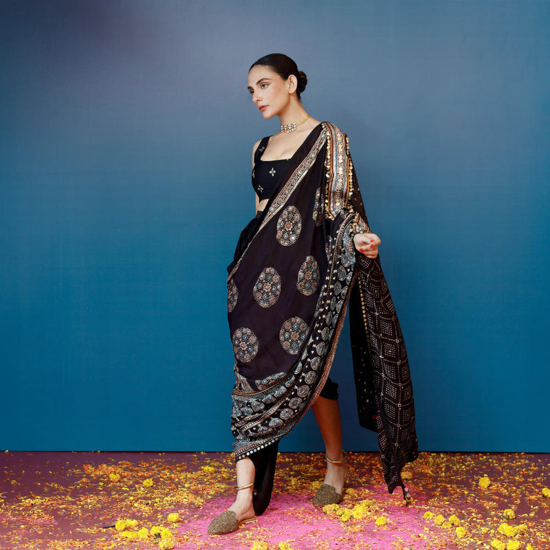 Aaram Baithak Ajrakh Drape Dress satin by PRAHNAAYA in black color for women Worldwide