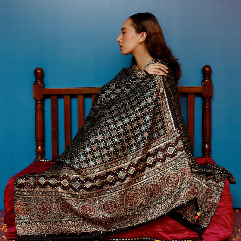 Dushala Black Ajrakh Reversible Wrap satin by PRAHNAAYA in black color for women Worldwide