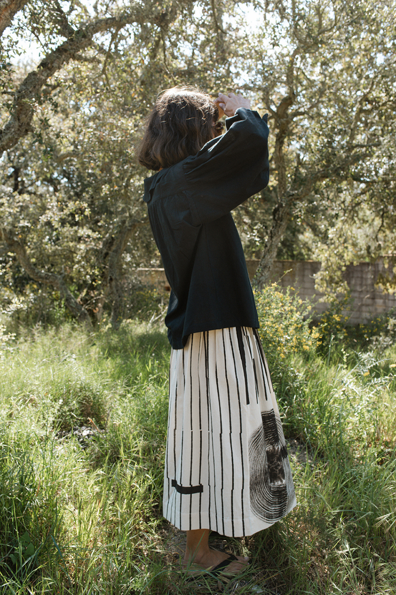 The Joy Skirt-Painted Black handwoven cotton skirt by World of Crow in black motif for women Worldwide