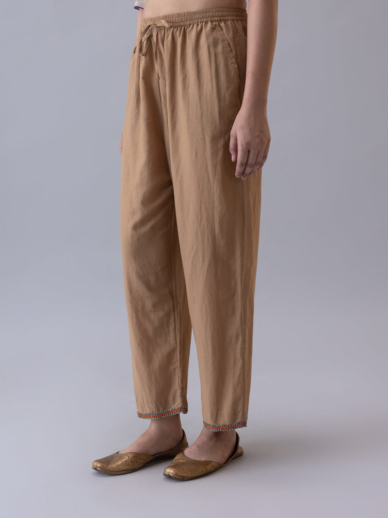 Annam Trousers-Beige silk by Shades of India in beige color for women Worldwide