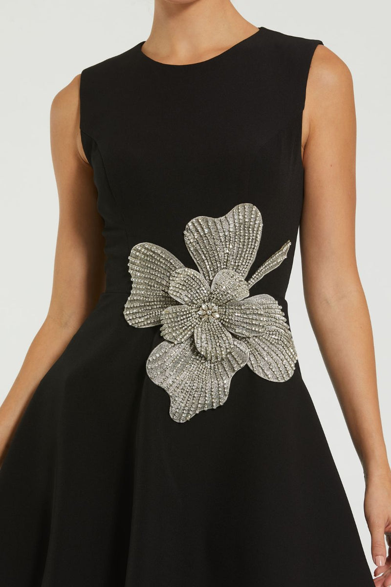 11829-Crepe Sleeveless Mini Dress With Rhinestone Flower by Mac Duggal in black color for women Worldwide