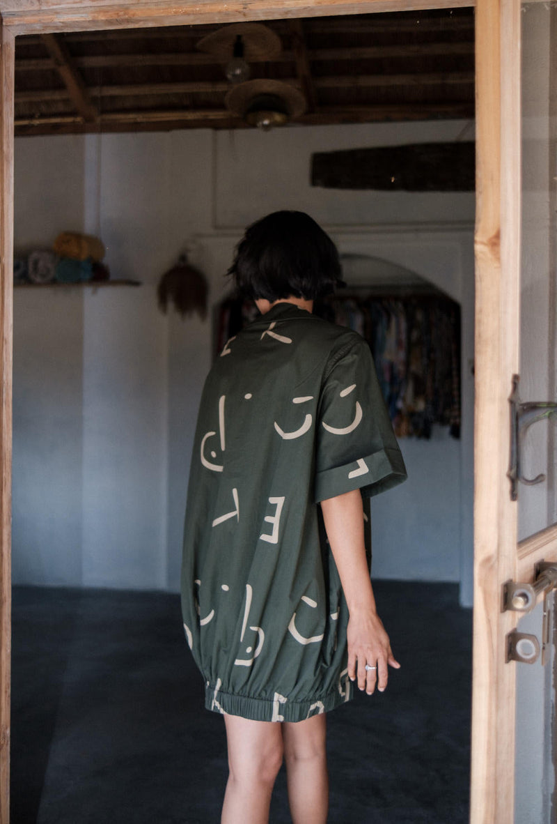 Sydney Shift Dress-Deep Green Line Printed cotton by The Terra Tribe in green color for women Worldwide