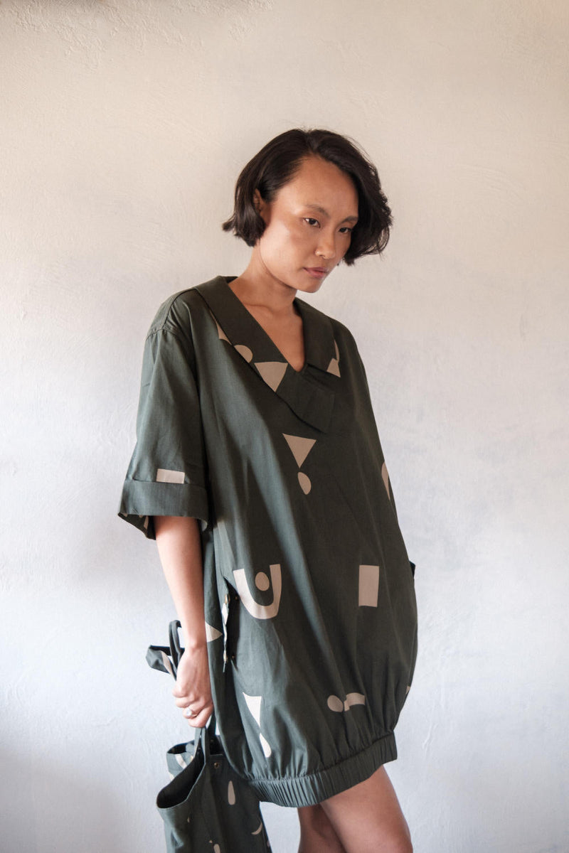 Sydney Shift Dress-Deep Green Triangle Printed cotton by The Terra Tribe in green color for women Worldwide