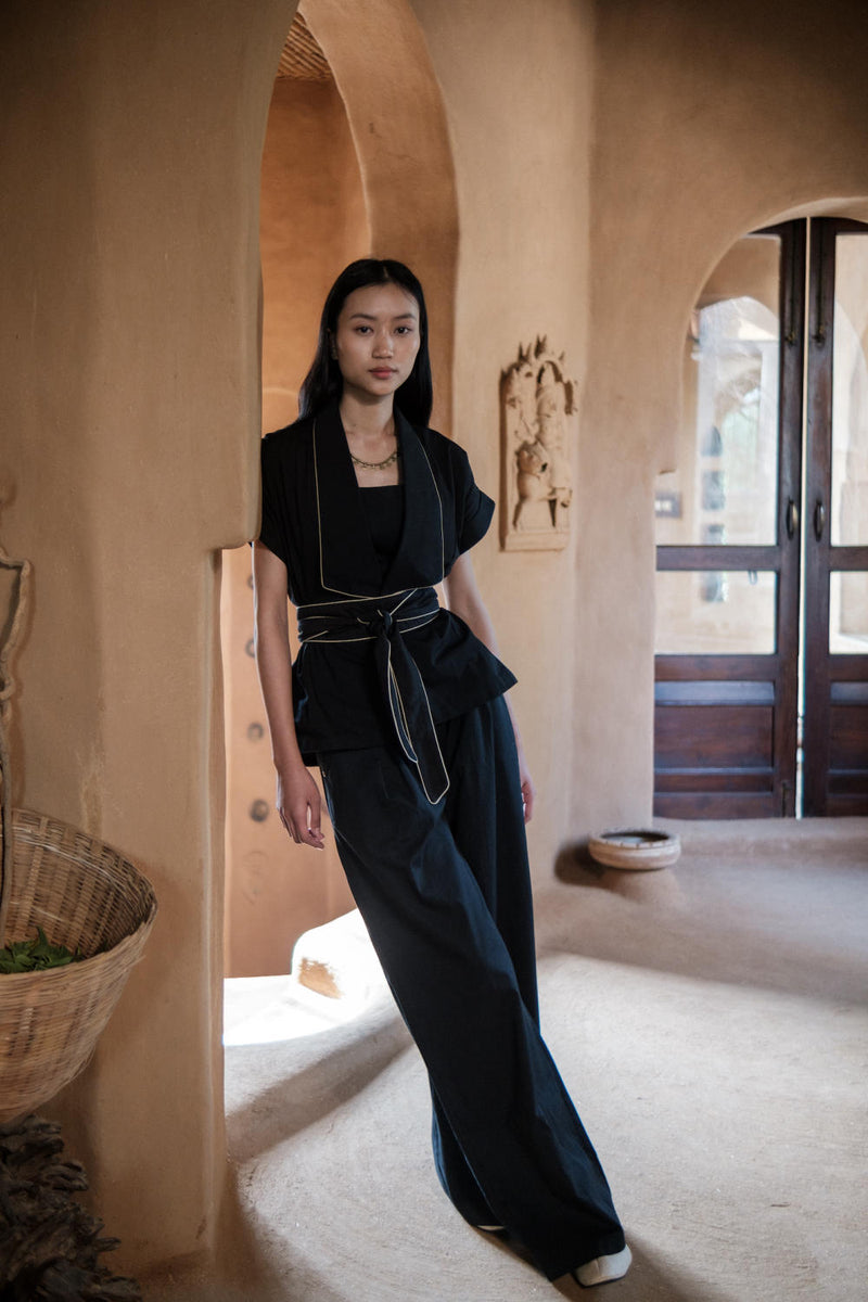 Friday Flared Pants-Black cotton by The Terra Tribe in black color for women Worldwide