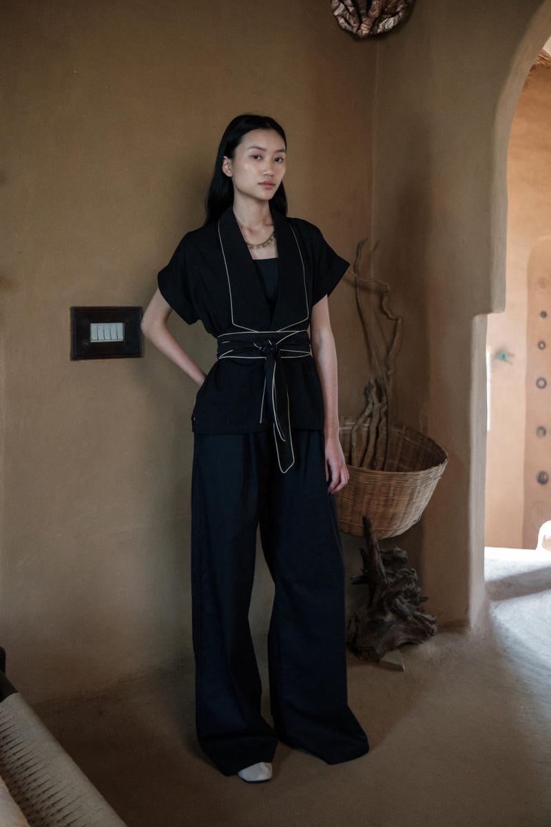 Friday Flared Pants-Black cotton by The Terra Tribe in black color for women Worldwide