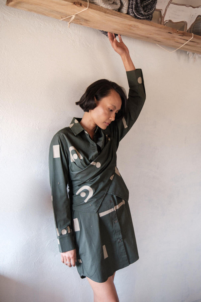 Seattle Wrap Shirt Dress-Deep Green Triangle Printed cotton by The Terra Tribe in green color for women Worldwide