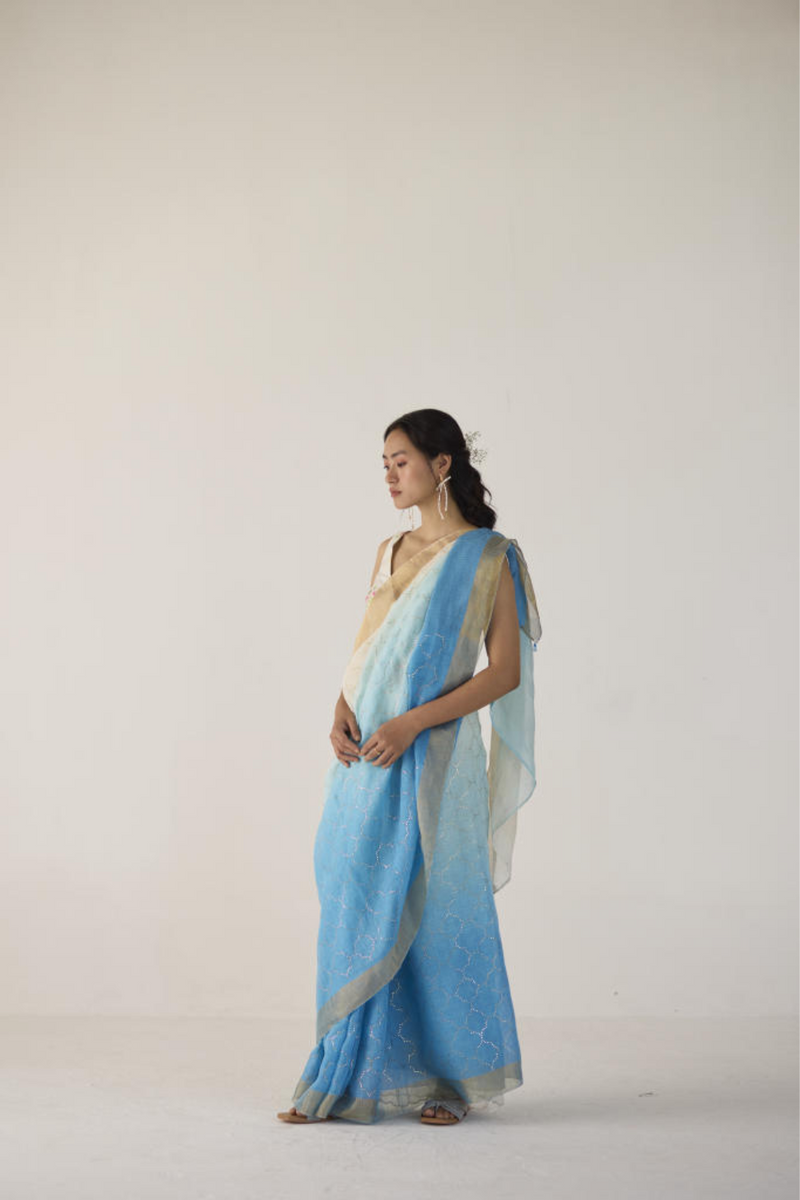 Blue Ombre Linen Sari with Gold Dot Print by Nadiya Paar in blue color for women Worldwide