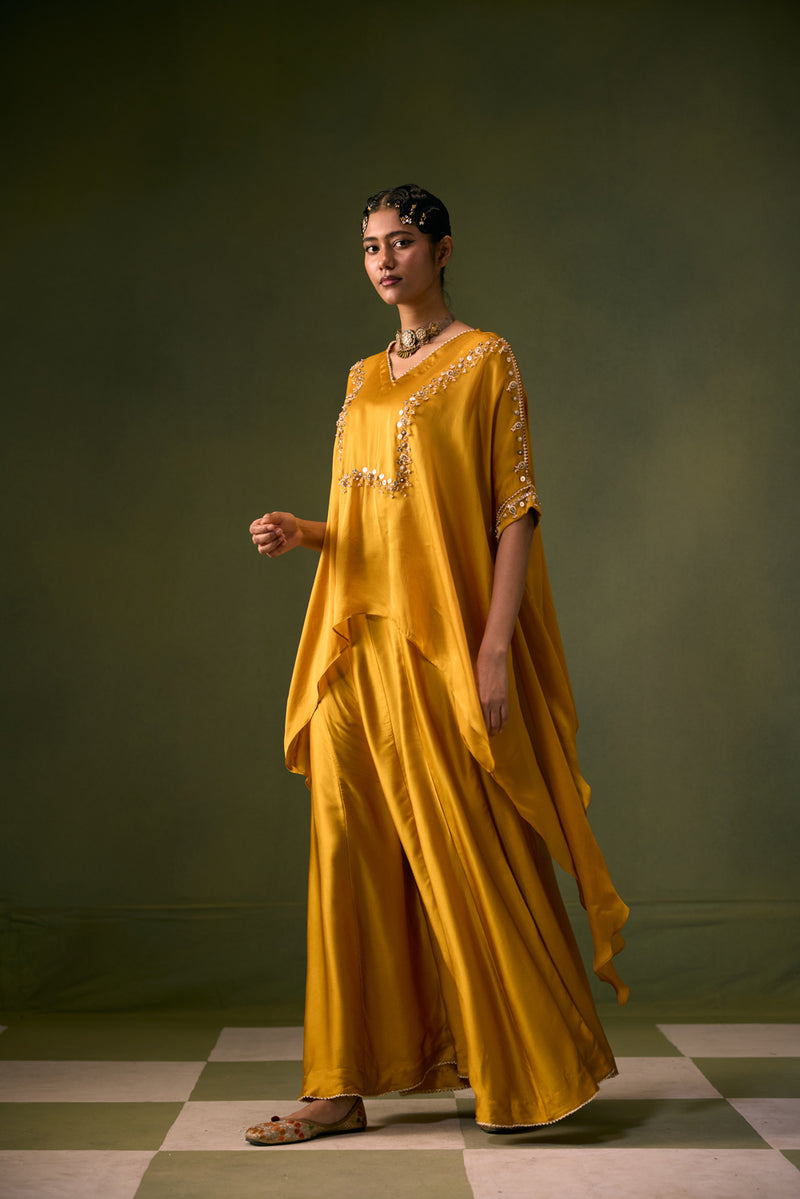 Cove Antifit Asymmetric Top with Flared Pants vegan satin, organza satin indo-western by PRAHNAAYA in musturd yellow for women Worldwide