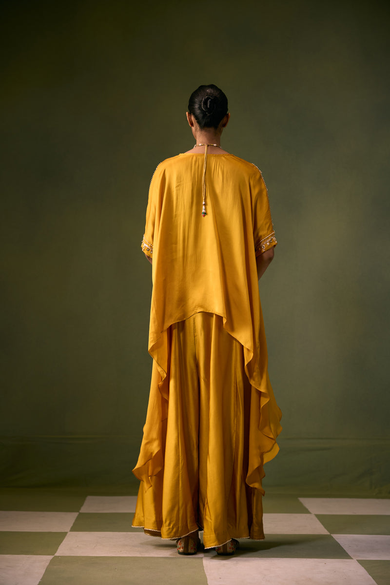 Cove Antifit Asymmetric Top with Flared Pants vegan satin, organza satin indo-western by PRAHNAAYA in musturd yellow for women Worldwide
