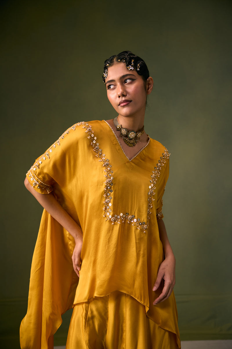Cove Antifit Asymmetric Top with Flared Pants vegan satin, organza satin indo-western by PRAHNAAYA in musturd yellow for women Worldwide