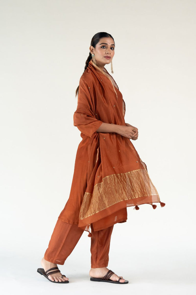 Gulzar Kurta Set with 
Ayra Odhani-Rust silk by Nirjara in rust color for women Worldwide