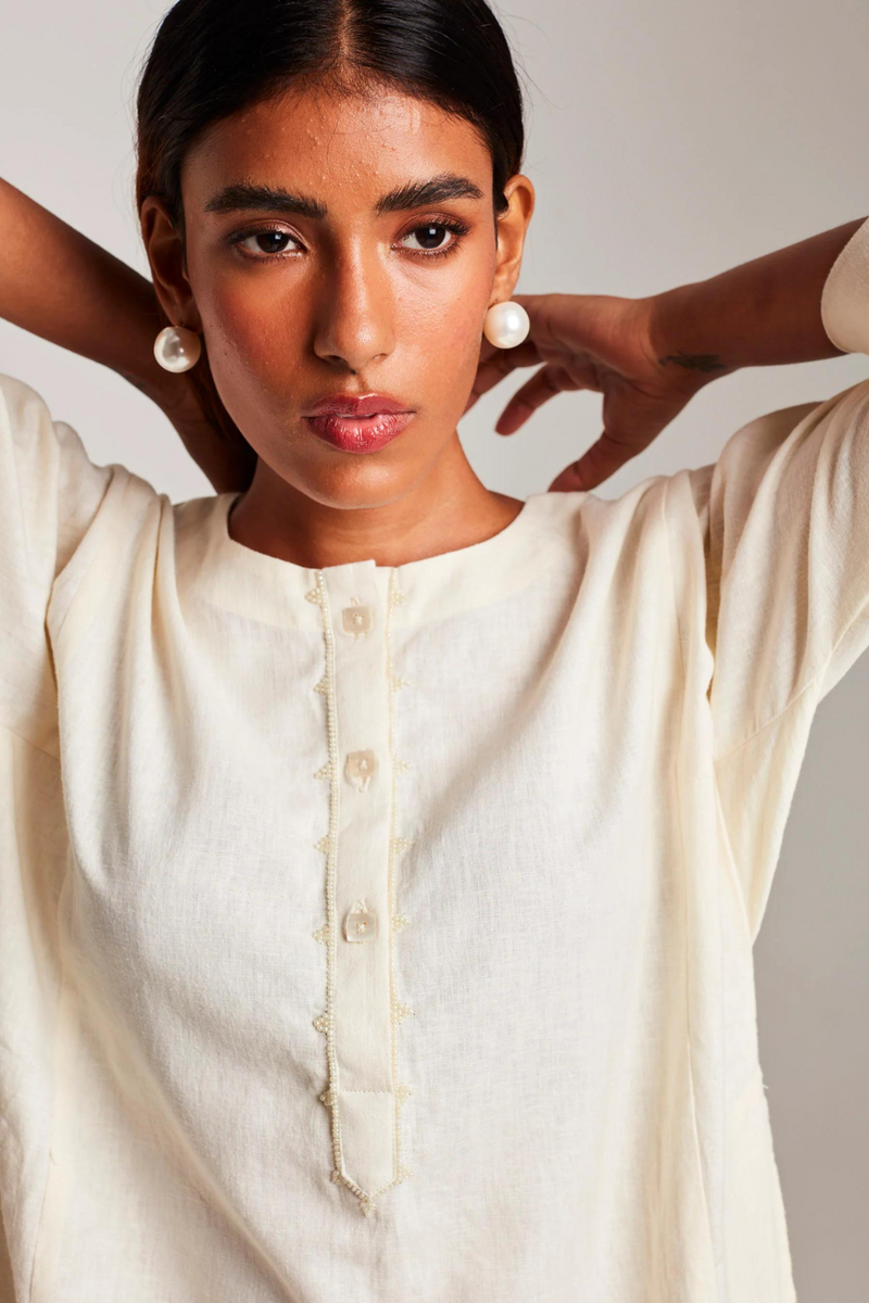 Vanilla Co-Linen Beaded Placket Kurta cotton by Saphed in white color for women Worldwide