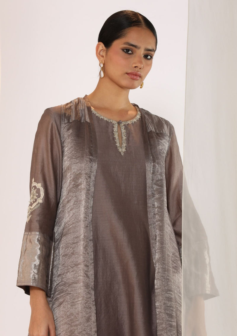 Embroidered silk kurta paired with tissue assymetric cape chanderi by Myoho in grey color for women Worldwide