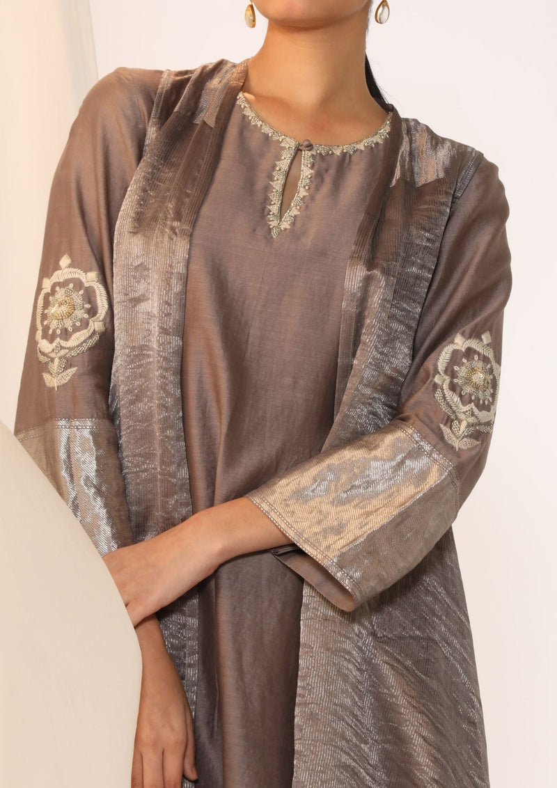 Embroidered silk kurta paired with tissue assymetric cape chanderi by Myoho in grey color for women Worldwide