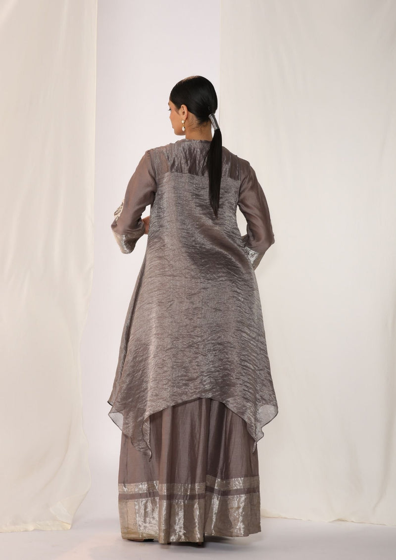Embroidered silk kurta paired with tissue assymetric cape chanderi by Myoho in grey color for women Worldwide