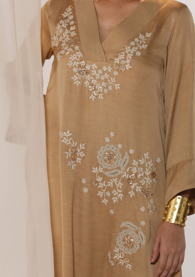 Linen satin v neck kurta with scatter embroidery satin by Myoho in beige color for women Worldwide