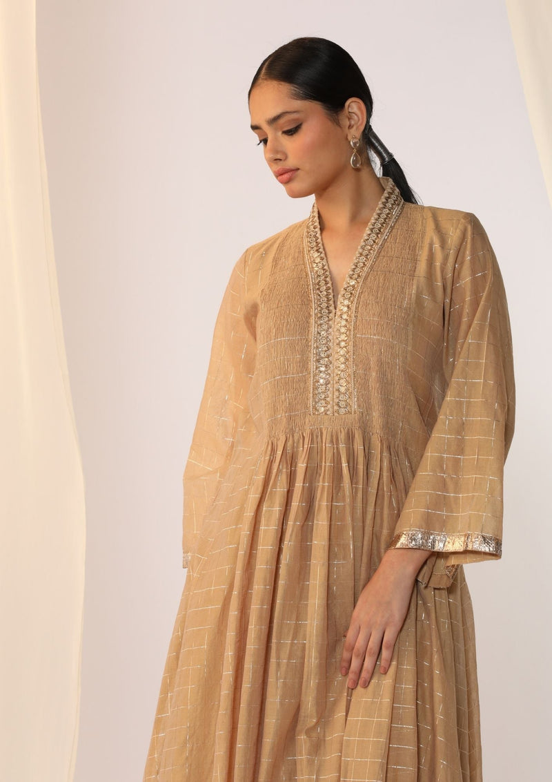 Checks kurta with a smocked neck with wide-leg pants chanderi by Myoho in beige color for women Worldwide