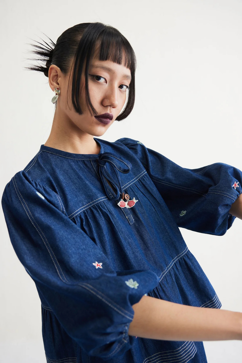 Deep Sea Sustainable Denim Peplum Top cotton by SUI in blue color for women Worldwide