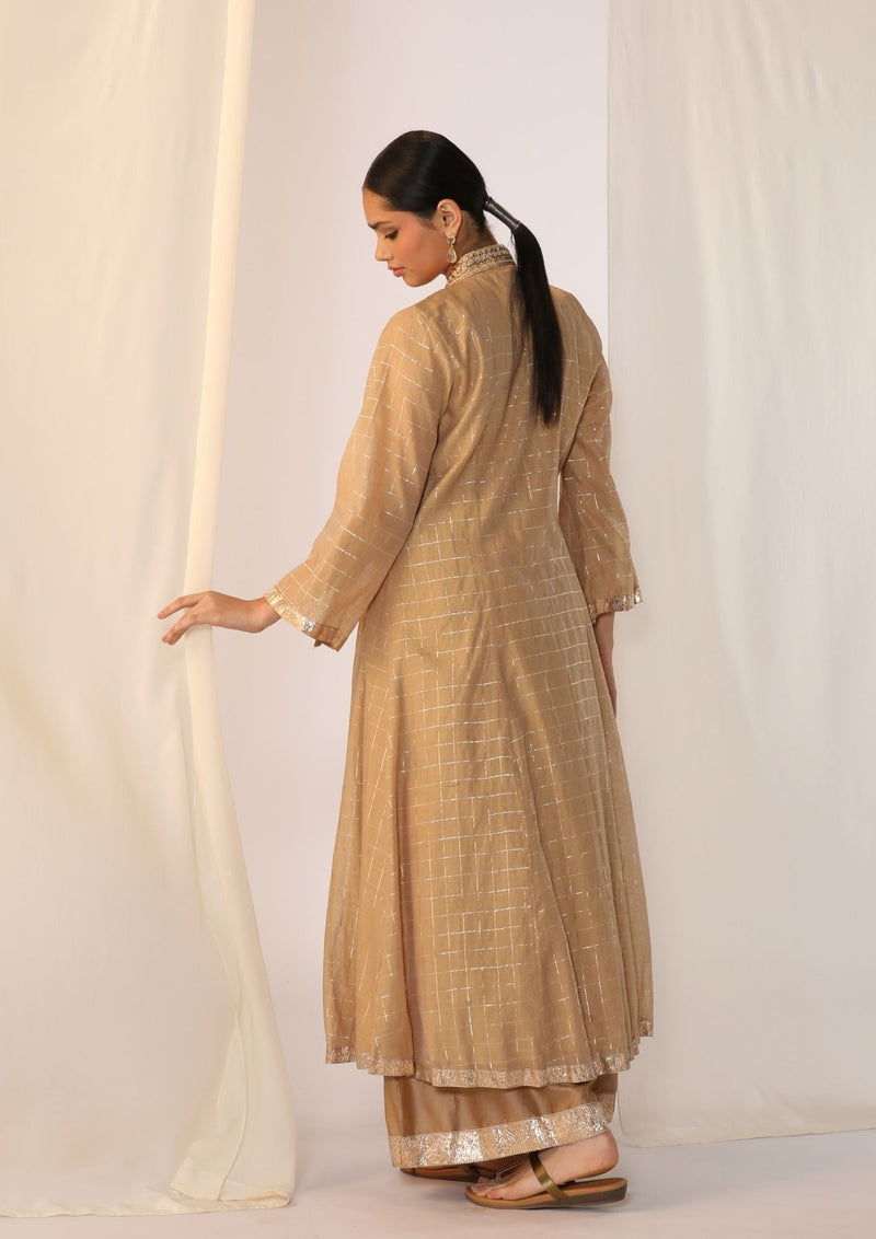 Checks kurta with a smocked neck with wide-leg pants chanderi by Myoho in beige color for women Worldwide