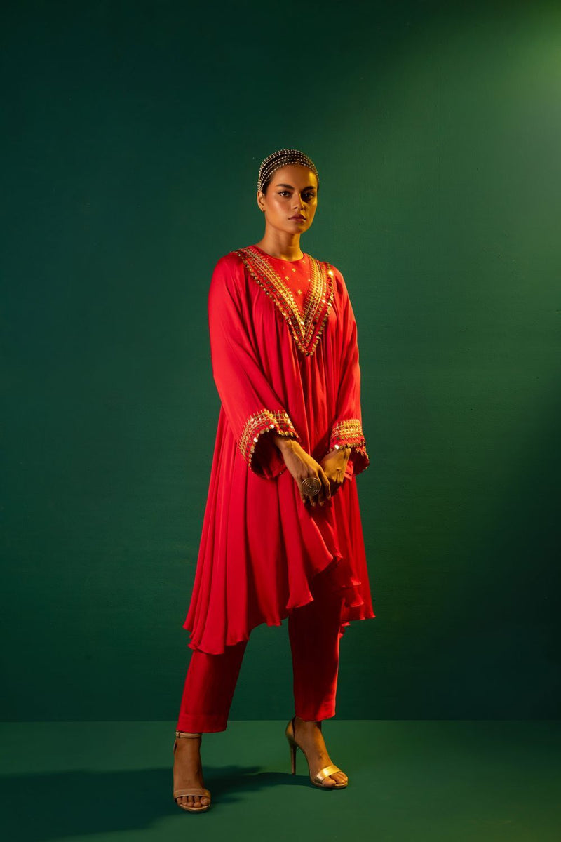 Chamakeen Asymmetrical Kurta Set satin by PRAHNAAYA in red color for women Worldwide