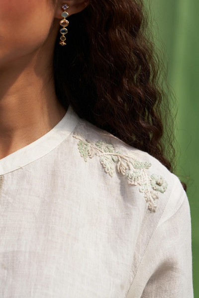 Noi Hand-Embroidered Linen Top
- Ivory