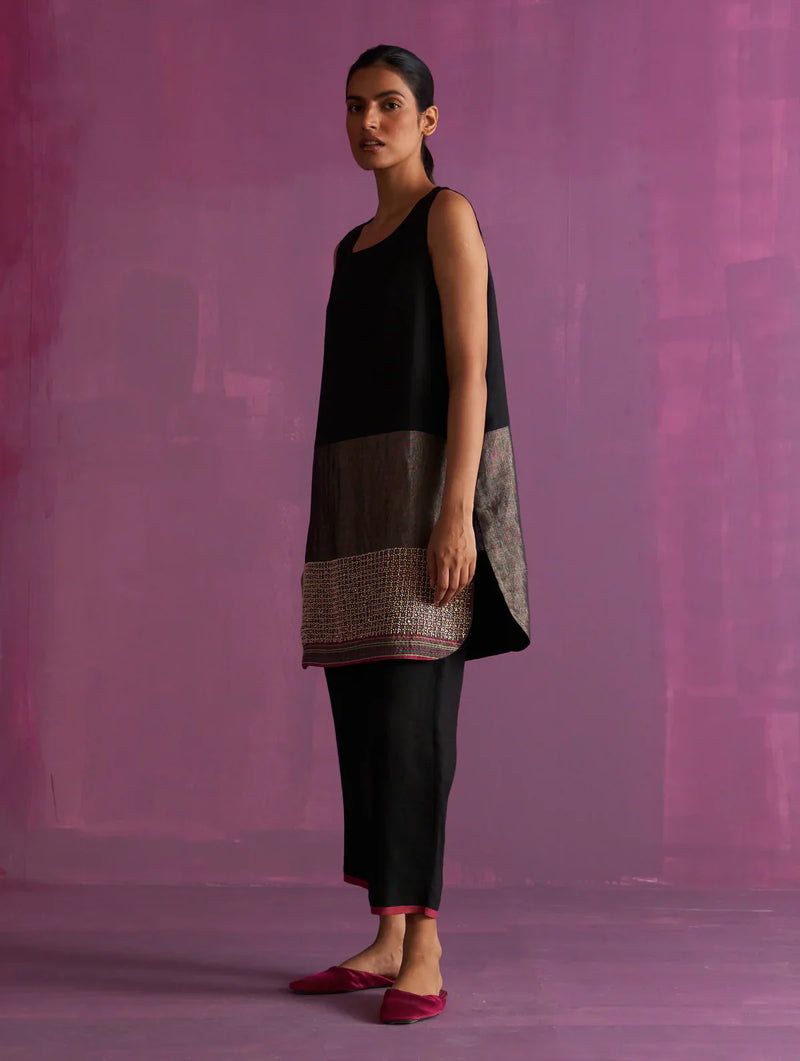 Irum Hand-Embroidered Sleeveless Kurta - Black linen by Manan in black color for women Worldwide