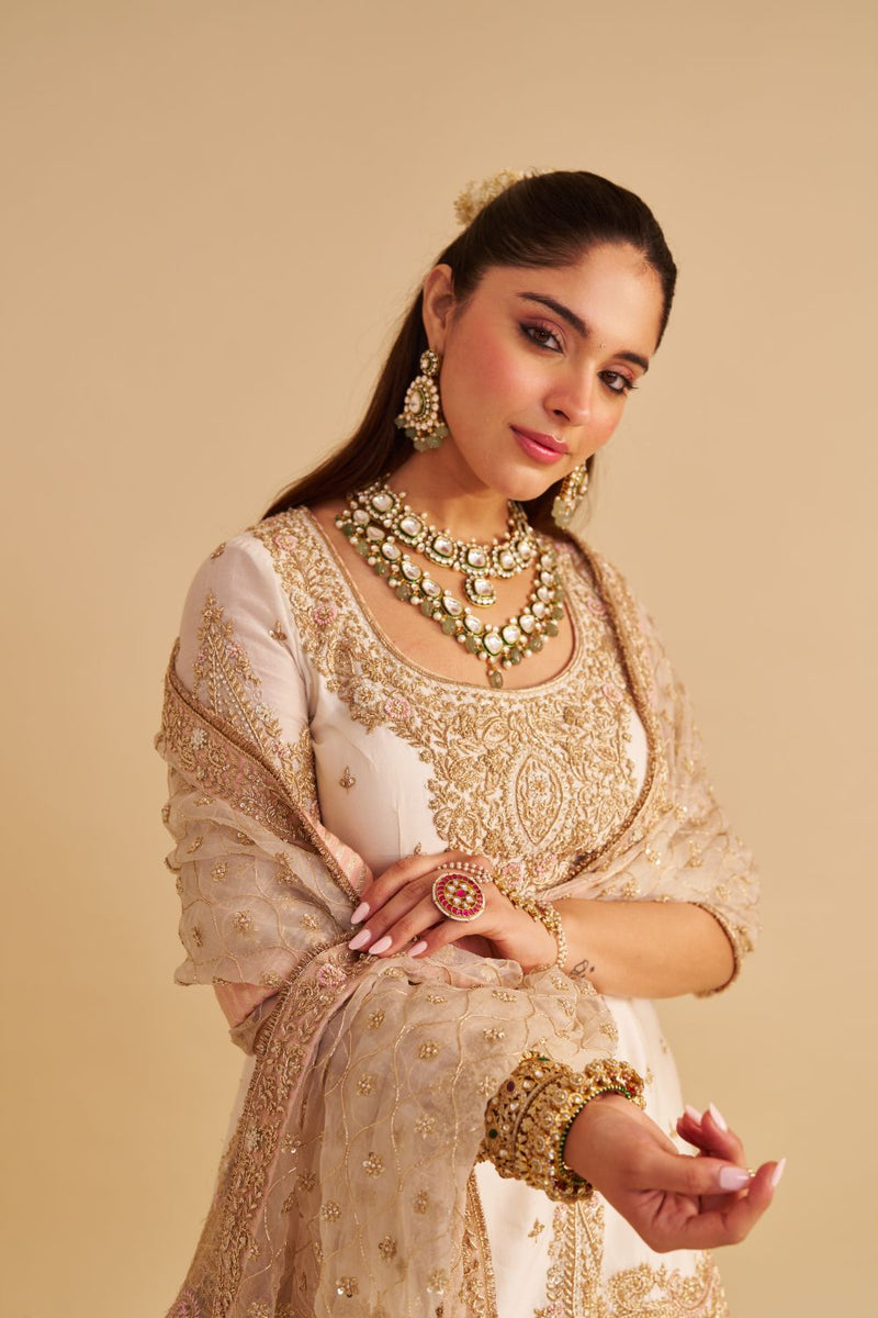 Alina - Dabka Zardozi Embroidered Silk Daisy Ivory Sharara Set silk by SHEETAL BATRA in ivory color for women Worldwide
